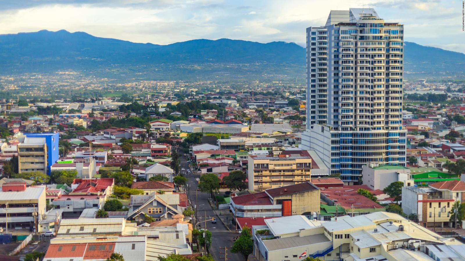 San Jose Costa rica capital city street view with mountains in the back